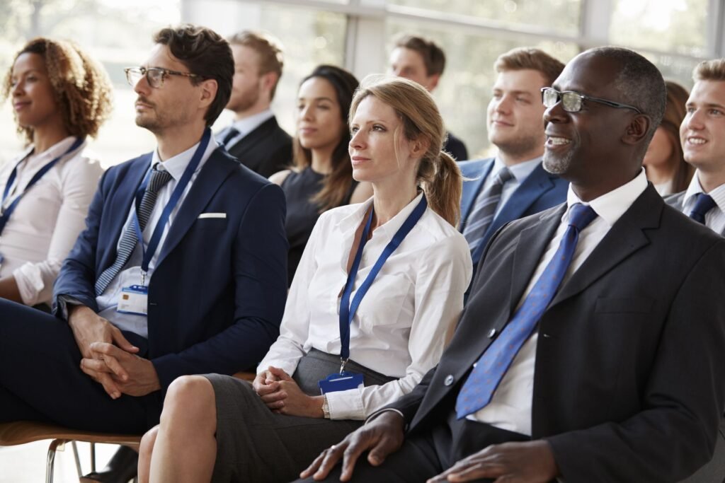 HR leaders listening at a conference