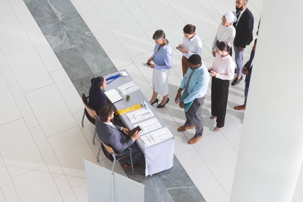 Registration desk with a queue, from above
