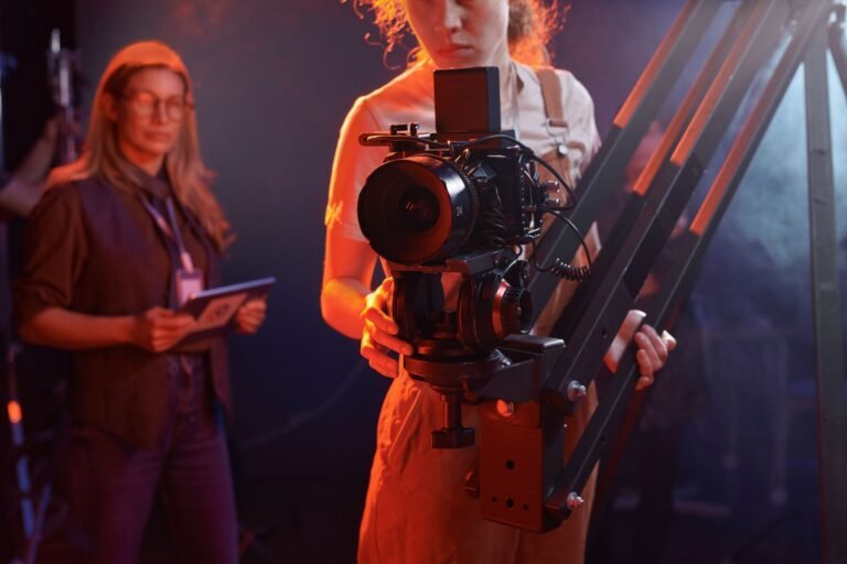 Cinematographer operating a rigged cinema camera